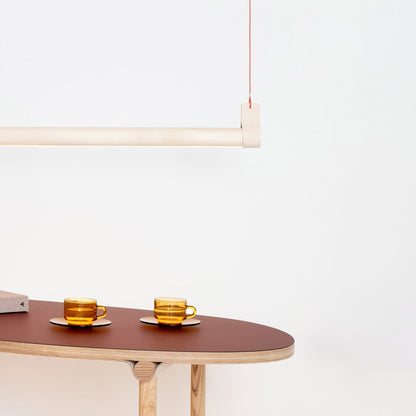 A Wave Beam in Maple finish and a Wave coffee table in Lozi's showroom